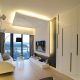 Foscarini Twiggy Terra Arc Lamp in Double Cove Starview's Living Room
